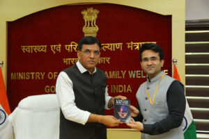 IRS officer Sahil Seth launches his book 'A confused mind story' with the first copy to Union health Minister Mansukh L Manda